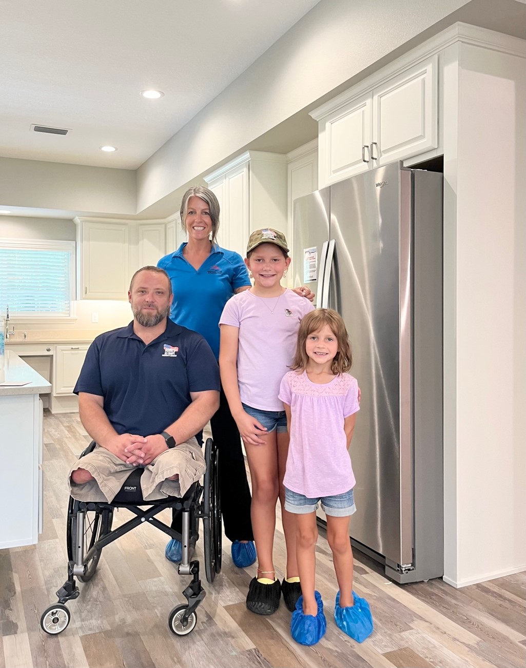 Marketing Manager, Susan Hart, and her daughters helped Homes For Our Troops welcome Army Sergeant Chad Rozanski to his new custom home in Orlando, FL.