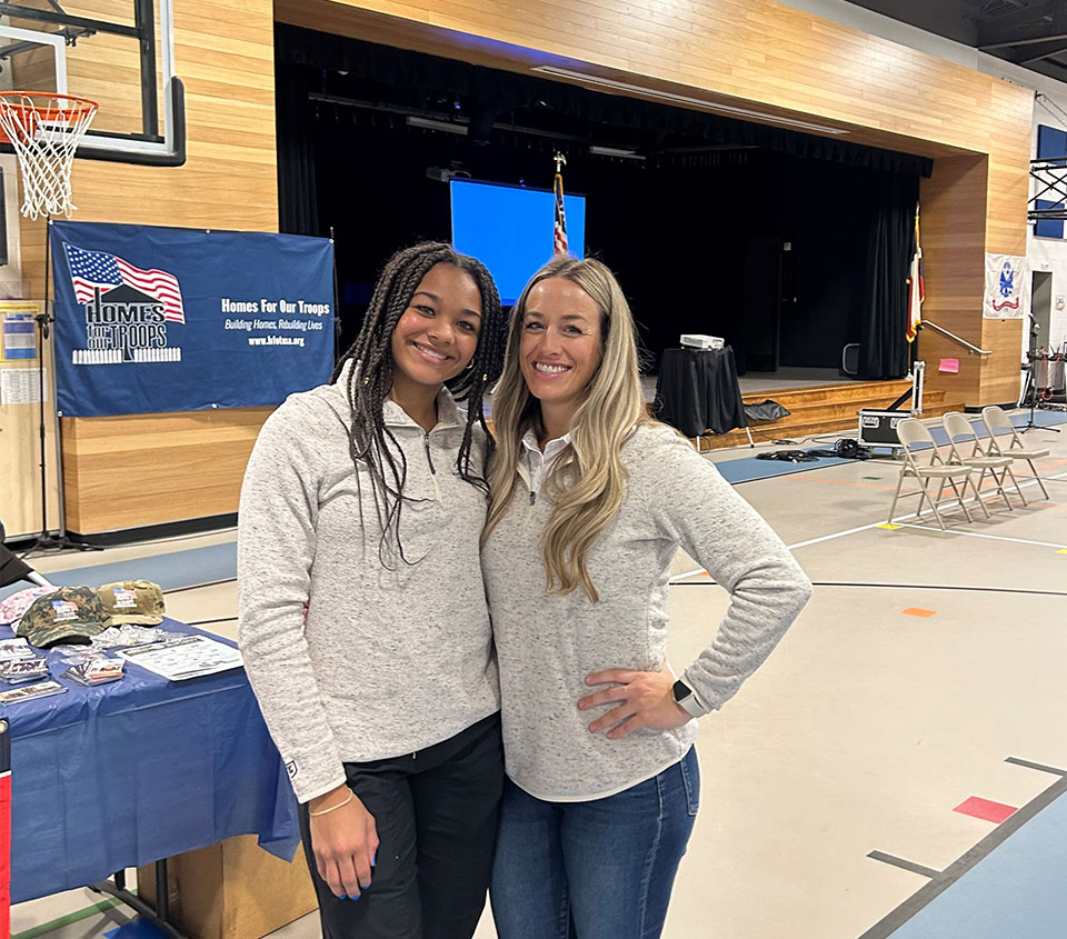 Acquisitions Manager Kelly Malone and her daughter volunteering at the Homes For Our Troops Community Kickoff event to build a custom home for an injured Army Sergeant in Liberty Hill, TX.